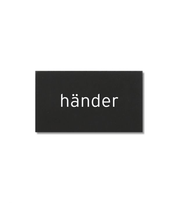 Kyltti 5x3cm händer musta